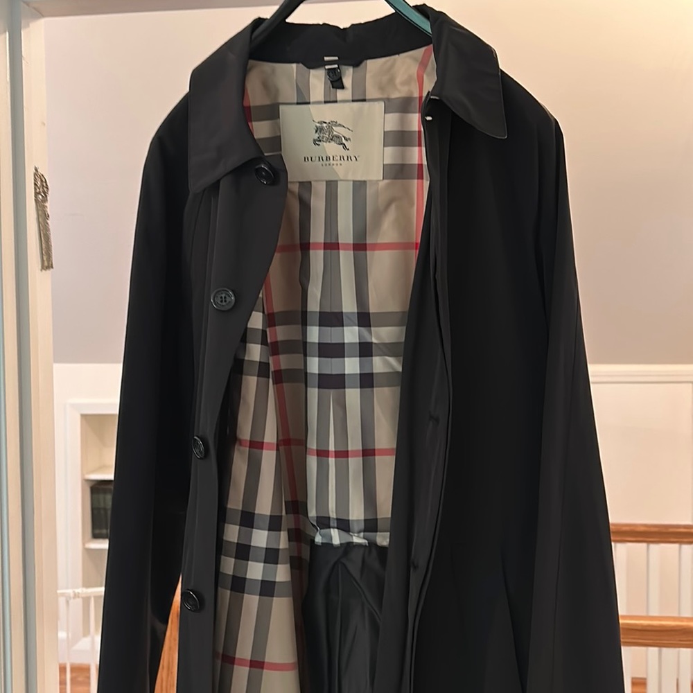Burberry men’s waterproof trench coat- L fits like an XL. Very comfortable.